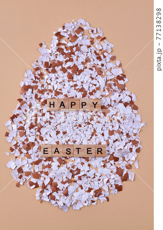 Happy easter and eggshells. Collection of eggshell pieces. 77138298