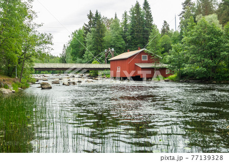 Old mill, dam and threshold on the river Jokelanjoki, Kouvola, Finland 77139328