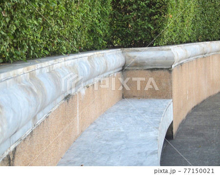 Chairs stone in the park 77150021