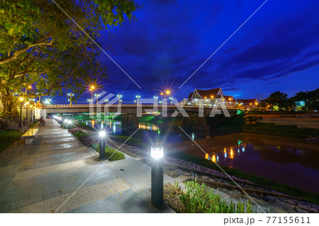 Natural evening In front of the at Wat Phra Si Rattana Mahathat also colloquially referred to as Wat Yai at view the Nan River and  the park for relaxing walking at sunset in Phitsanulok, Thailand. 77155611