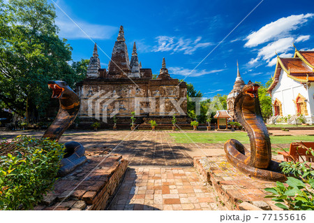 Bokeh Light shadow of solar eclipse on floor at Wat Chet Yot, seven pagoda temple It is a major tourist attraction in Chiang Mai, Thailand.with evening,Temple in Chiang Mai.21 june 2020 77155616