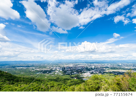 view in the mountains with cityscape over the city airatmosphere bright blue sky background abstract clear texture with white clouds. of Chiang Mai,Thailand 77155674
