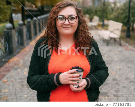 park walk happy woman coffee break enjoying 77163783