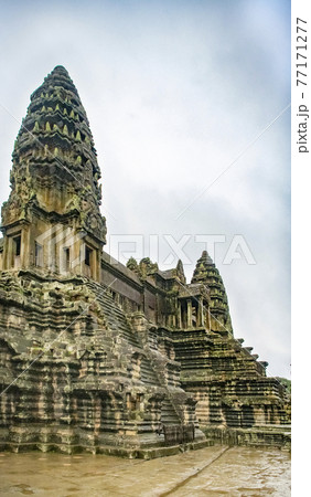 Angkor Wat is the largest temple in the world (Cambodia, 2019). It is raining 77171277