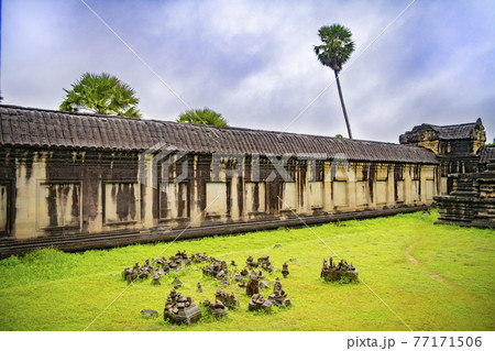 Angkor Wat is the largest temple in the world (Cambodia, 2019). It is raining 77171506