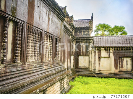 Angkor Wat is the largest temple in the world (Cambodia, 2019). It is raining 77171507