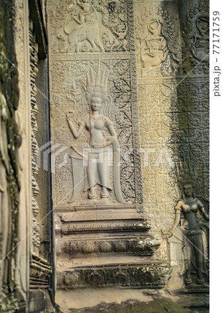 Angkor Wat is the largest temple in the world (Cambodia, 2019). It is raining 77171759