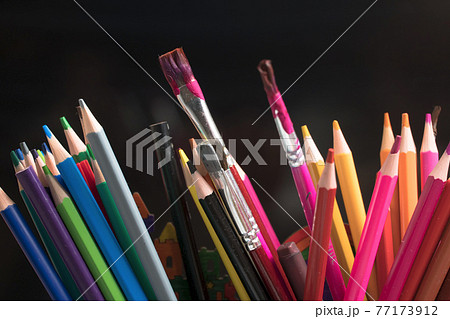A set of colored pencils, stationery. Lots of colorful pencils on the table. Drawing and Visual Art Kits A set of colored pencils, stationery. Lots of colorful pencils on the table. Drawing and Visual Art Kits 77173912