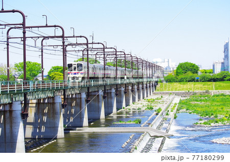 多摩川橋梁を通過する京王線 多摩川橋梁を通過する京王線 77180299
