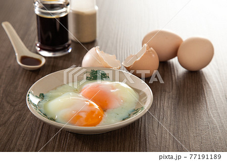 Half boiled organic eggs,  popular Chinese style breakfast in Malaysia kopitiam. 77191189
