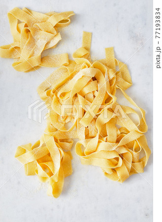 Homemade Pasta. Seen from above. Close-up. Homemade food. Homemade Pasta. Seen from above. Close-up. Homemade food. 77193834