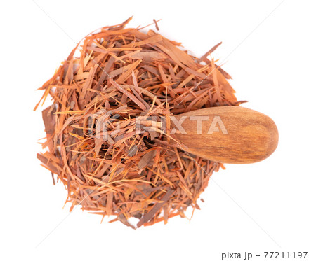 Lapacho herbal tea in wooden spoon, isolated on white background. Natural Taheeboo dry tea. Pau d'arco herb. Tabebuia heptophylla. Top view. Lapacho herbal tea in wooden spoon, isolated on white background. Natural Taheeboo dry tea. Pau d'arco herb. Tabebuia heptophylla. Top view. 77211197