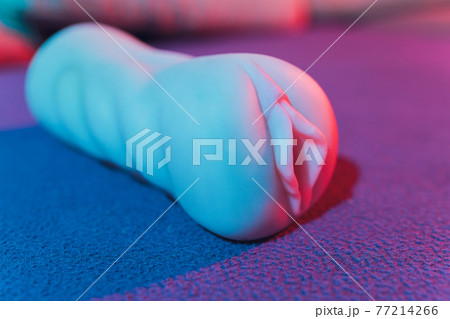 Close-up of male sex toy, realistic vagina masturbator. 77214266