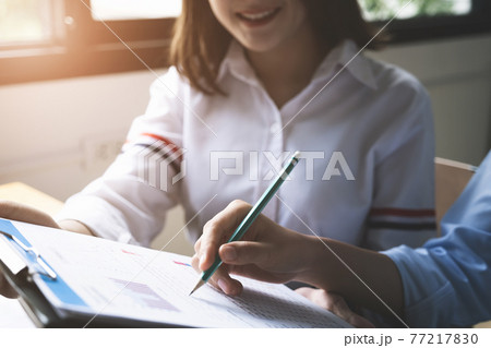 Fund managers team consultation and discuss about analysis Investment stock market by financial paper report. Fund managers team consultation and discuss about analysis Investment stock market by financial paper report. 77217830