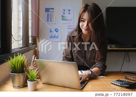 Beautiful businesswoman talking by video conference with her business team. work from home concept. Beautiful businesswoman talking by video conference with her business team. work from home concept. 77218097