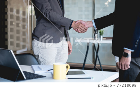 Business partnership meeting concept. Image businessmans handshake. Successful businessmen handshaking after good deal. Business partnership meeting concept. Image businessmans handshake. Successful businessmen handshaking after good deal. 77218098