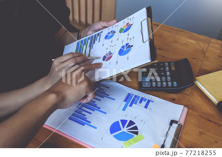 Group of Businesswoman and Accountant checking data document on digital tablet for investigation of corruption account . Anti Bribery concept. Group of Businesswoman and Accountant checking data document on digital tablet for investigation of corruption account . Anti Bribery concept. 77218255