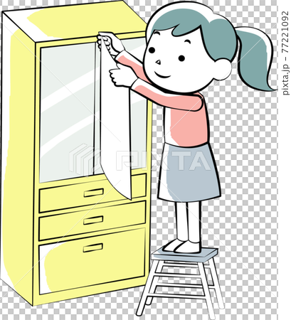 A woman who puts a shatterproof sheet on the cupboard A woman who puts a shatterproof sheet on the cupboard 77221092