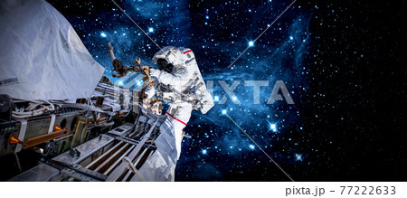 Astronaut spaceman do spacewalk while working for space station 77222633