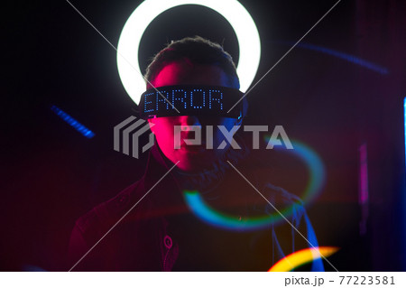 Cyberpunk style portrait of man in futuristic costume. 77223581
