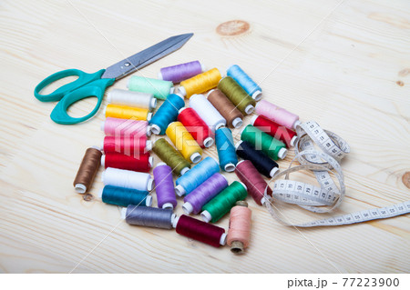 spools of thread, scissors and centimeter 77223900