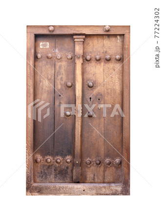 Antique closed wood door. Vintage wooden double door 77224302