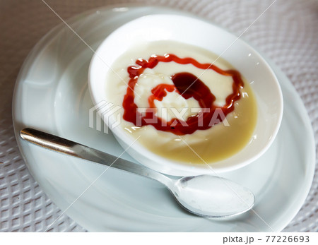 Natillas, typical dessert made of milk, eggs and sugar. 77226693
