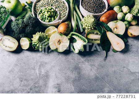 Variety of Green Vegetables and Fruits 77228731