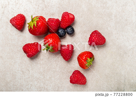 Fresh summer berries such as blueberries, strawberries, raspberries 77228800