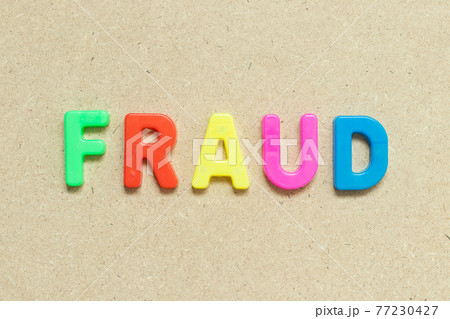 Color alphabet letter with word fraud on wood background Color alphabet letter with word fraud on wood background 77230427