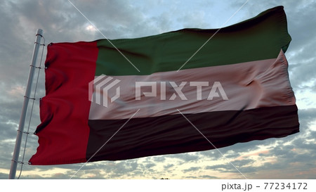 Flag of United Arab Emirates waving in the wind against deep beautiful sky at sunset. 3d rendering 77234172