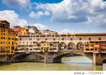 Ponte Vecchio Old Bridge on Arno River and Vasari Corridor Florence Tuscany Italy 77234427