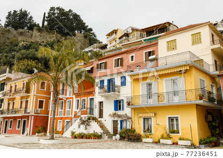 Colorful two-story mansions in Parga town in Epirus, northwestern Greece on the Ionian coast in spring 77236451