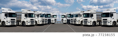 Semi trucks in a rows Semi trucks in a rows 77238155