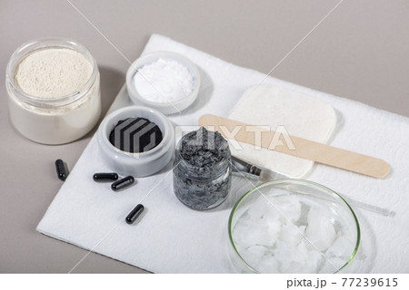 Ingredients for a homemade charcoal facial mask. Ingredients for a homemade charcoal facial mask. 77239615