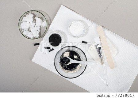 Ingredients for a homemade charcoal facial mask. Ingredients for a homemade charcoal facial mask. 77239617