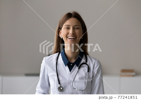 Portrait of smiling female doctor pose at workplace Portrait of smiling female doctor pose at workplace 77241851
