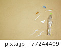 top view a garbage on a sand beach. save th earth concept. 77244409