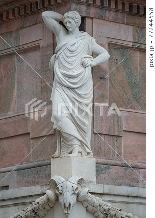 Statue of beautiful Roman noble man at the obelisk in the Old Market square (Alter Markt) in downtown of Potsdam, Germany Statue of beautiful Roman noble man at the obelisk in the Old Market square (Alter Markt) in downtown of Potsdam, Germany 77244558