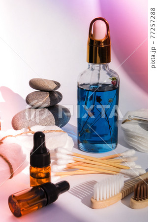 Reusable and recycable bathroom accessories on white background. Trendy shadows. Zero waste concept. Natural cosmetics and eco living concept Reusable and recycable bathroom accessories on white background. Trendy shadows. Zero waste concept. Natural cosmetics and eco living concept 77257288