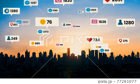 Social media icons fly over city downtown showing people engagement connection Social media icons fly over city downtown showing people engagement connection 77261077