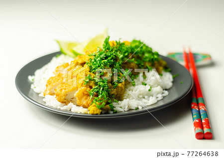 Crispy chicken perked up with an aromatic katsu curry sauce and fragrant fluffy rice Crispy chicken perked up with an aromatic katsu curry sauce and fragrant fluffy rice 77264638