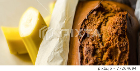 Freshly baked banana cake with nuts, banana bread in baking form 77264694