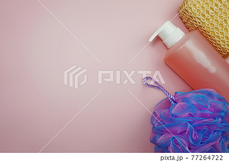 Shower accessories bath items on pink background Shower accessories bath items on pink background 77264722