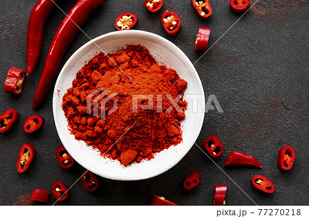 Red chili pepper, dried chillies on dark background. Top view 77270218