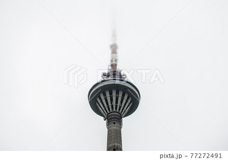 Tallinn TV tower in the white fog. Tallinn, Estonia 77272491