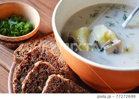 Champignon soup with potatoes and dill 77272699