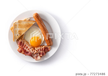 Traditional American breakfast with fried egg,toast,bacon and sausage 77273486