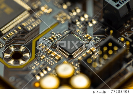 Closeup of computer board with conductors 77288403