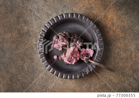 Original dessert fruit blackberry broken in half according to the idea of French confectioners  77300355